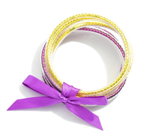 Purple/Gold Rhinestone Filled Jelly Bangle Bracelet Stack With Bow Accent